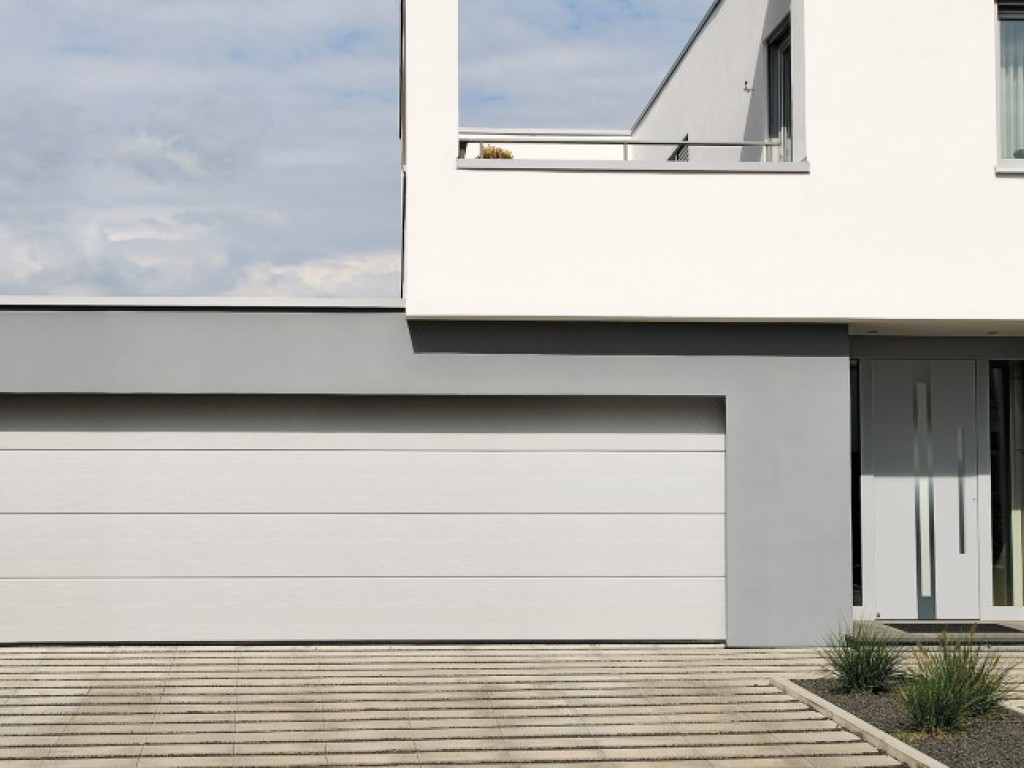 Vendita e installazione di porte per garage Hormann a Segrate e dintorni